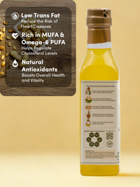 Back of Ekaris Groundnut Oil bottle showing low trans fat, rich in MUFA and Omega-6 PUFA and natural antioxidants benefits