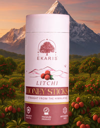 Ekaris Litchi Honey Sticks tube placed in front of Himalayan mountain with litchi orchard background
