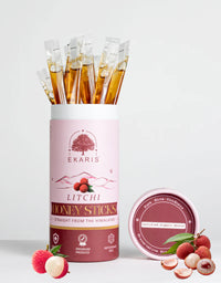 Ekaris Organic Honey Litchi Flavored Sticks tube with certified organic nectar lid and fresh litchi fruits