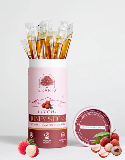 Ekaris Organic Honey Litchi Flavored Sticks tube with certified organic nectar lid and fresh litchi fruits