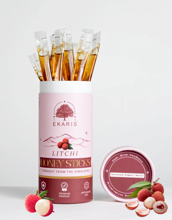 Ekaris Organic Honey Litchi Flavored Sticks tube with certified organic nectar lid and fresh litchi fruits