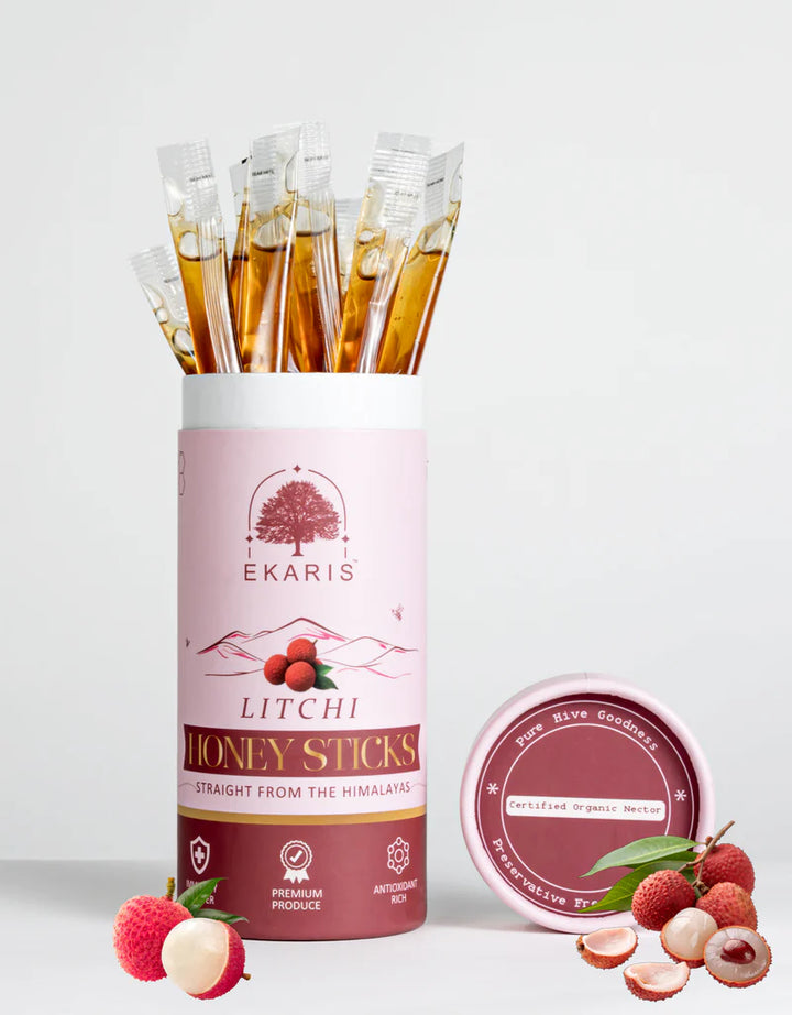 Ekaris Organic Honey Litchi Flavored Sticks tube with certified organic nectar lid and fresh litchi fruits