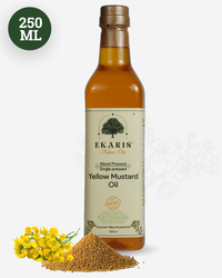 Ekaris Wood Pressed Single Pressed Yellow Mustard Oil 250ml Kachighani bottle with yellow mustard flowers and seeds on white background