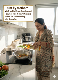  Indian mother cooking with Ekaris Yellow Mustard Oil showing trusted by mothers benefits including brain development, heart health and no trans fats